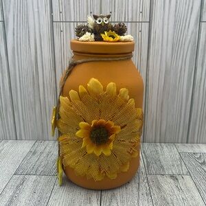 Autumn jar with sunflower